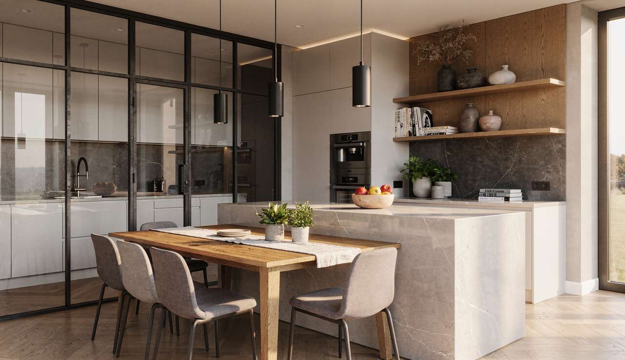 Une cuisine semi-ouverte gr&acirc;ce &agrave; la verri&egrave;re d'atelier